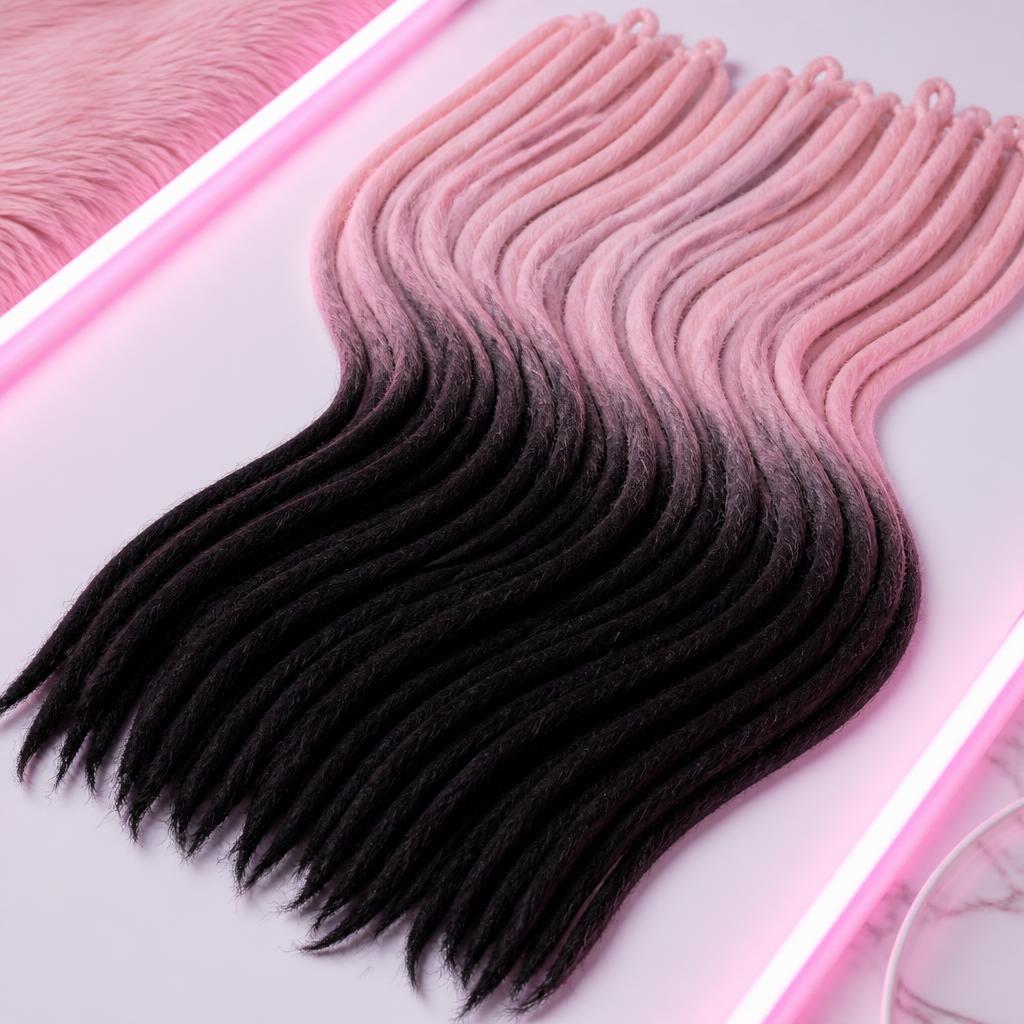 Flat lay of light pink dreadlock extension texture